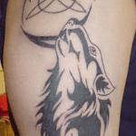 Wolf tattoo: a photo depicting a wolf for men What does a wolf grin tattoo mean