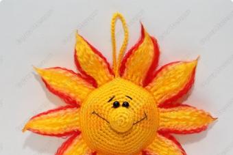 Crocheted amigurumi sun